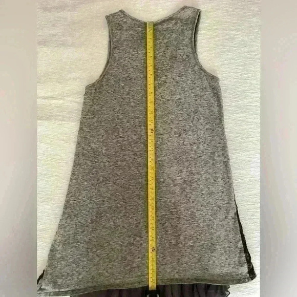 Unique elongated sequence top from a European luxury brand - Picture 8 of 13